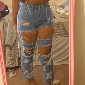 Light wash super distressed boyfriend jeans